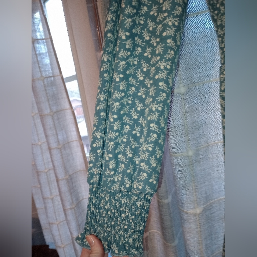 Women's blue dress with white flowers